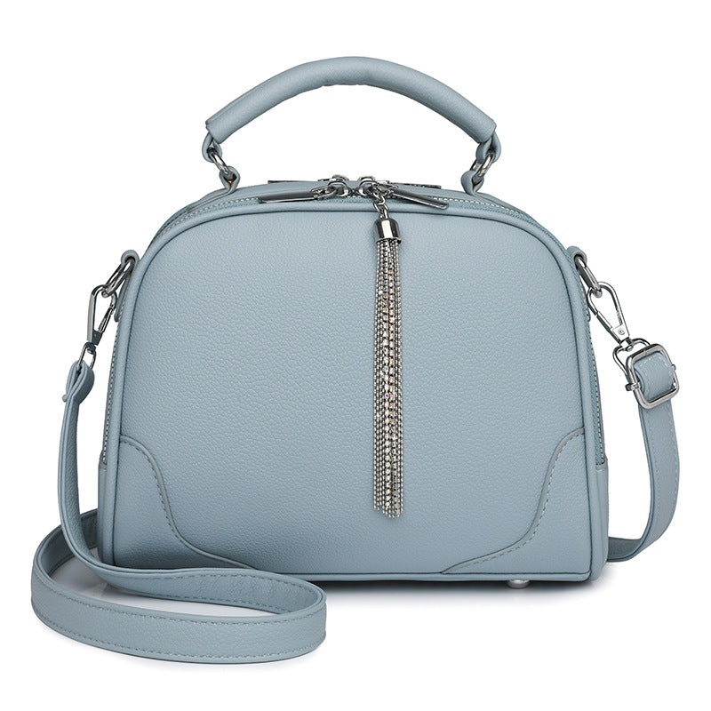Blue Chic Mini Round Crossbody Bag for Women - Elegant Handbag with Tassel Accent