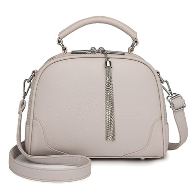 Beige Chic Mini Round Crossbody Bag for Women - Elegant Handbag with Tassel Accent