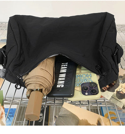 An elegant black shoulder bag for travel and work