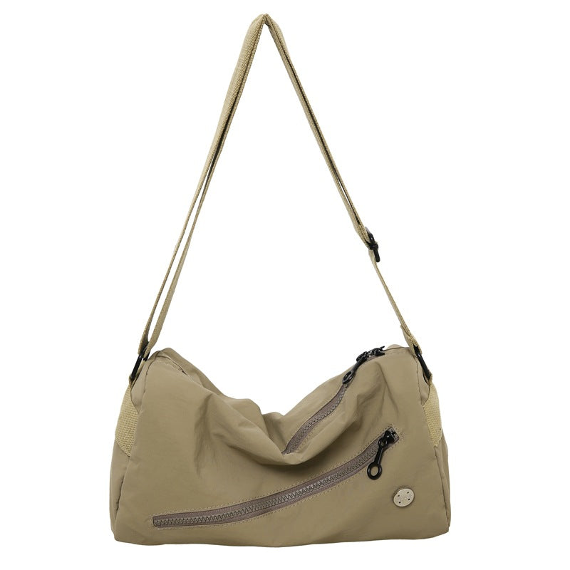 An elegant khaki shoulder bag for travel and work
