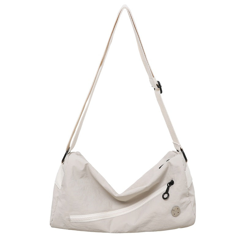 An elegant white shoulder bag for travel and work